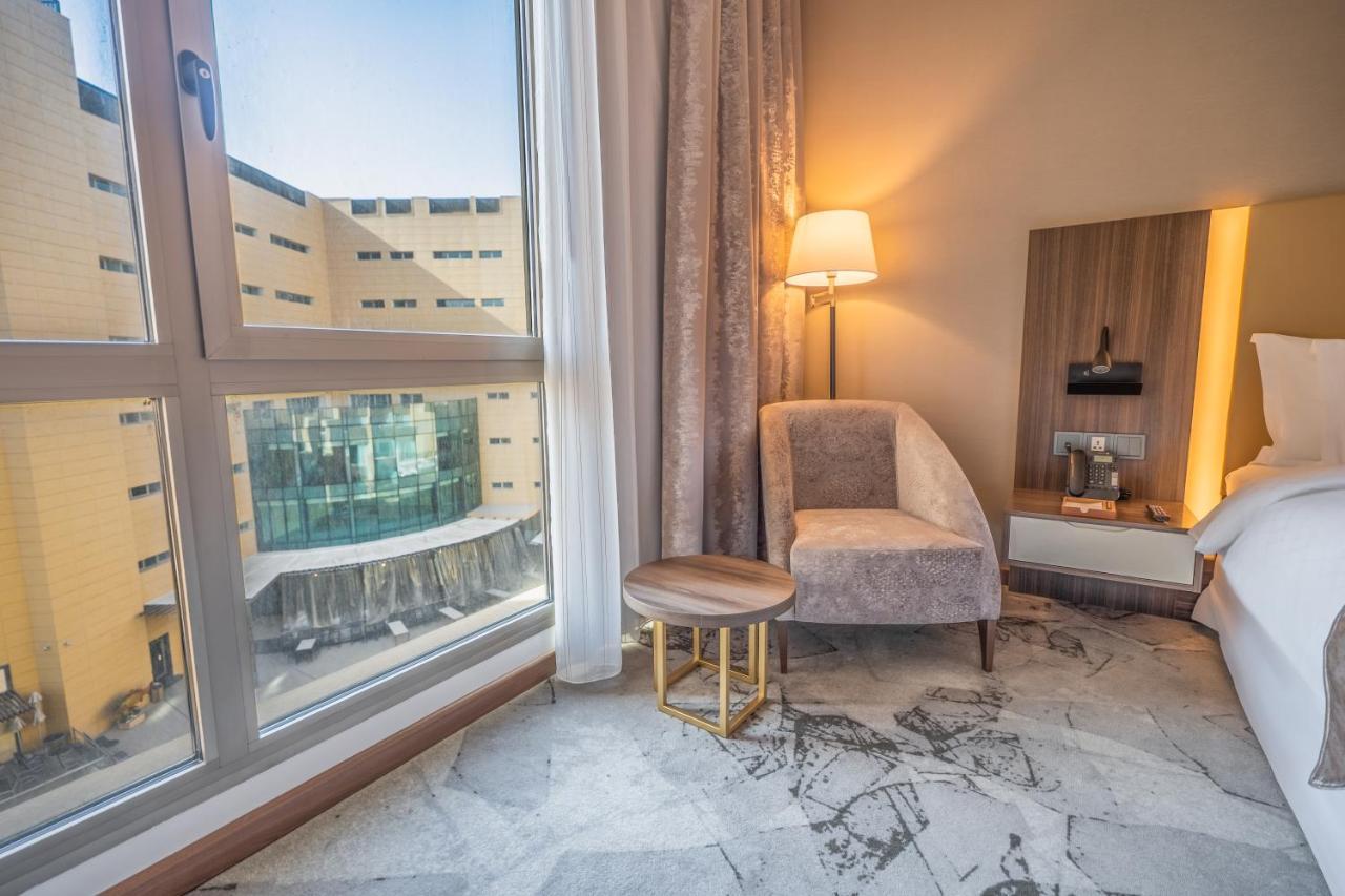 Grand Millennium Al Seef Basra Bagian luar foto